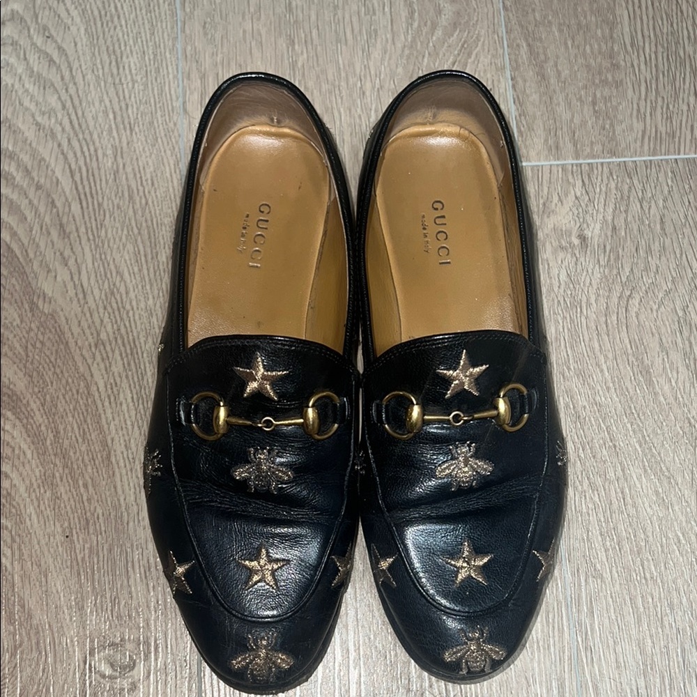 Gucci Black Loafers with Gold Star Embellishments